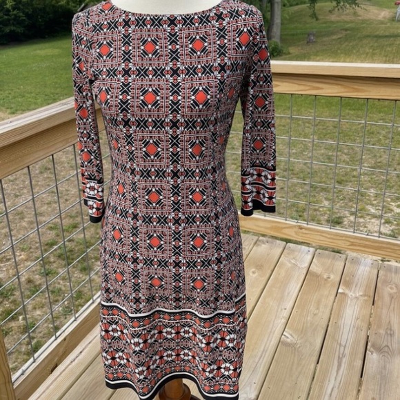 WISP 4P WOMEN’S 3/4 FLORAL ORANGE AND BLACK - Picture 1 of 3